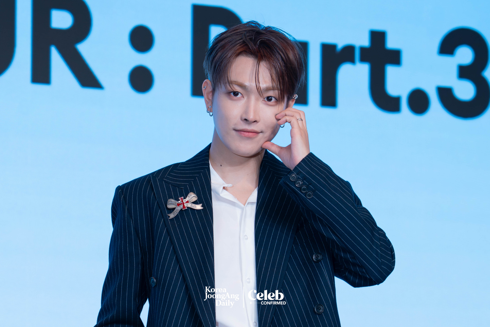 Ateez’s Hongjoong poses for photos during a news conference for the release of its 12th EP, “Golden Hour: Part.3,” at Hotel Naru Seoul MGallery Ambassador in western Seoul. [DANIELA GONZALEZ PEREZ]