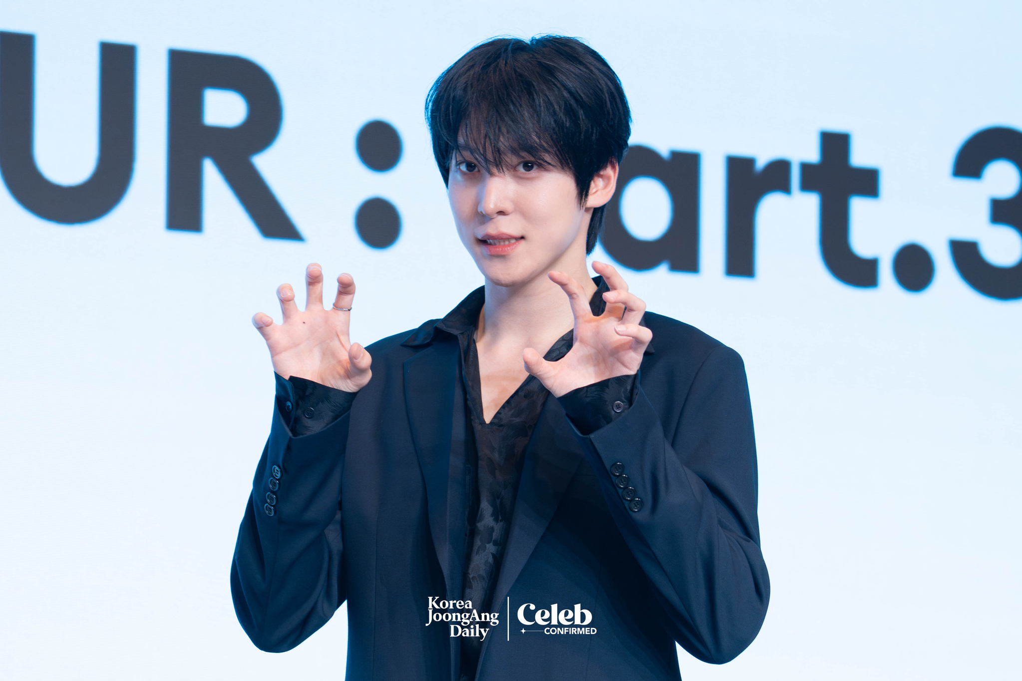 Ateez’s Yunho poses for photos during a news conference for the release of its 12th EP, “Golden Hour: Part.3,” at Hotel Naru Seoul MGallery Ambassador in western Seoul. [DANIELA GONZALEZ PEREZ]