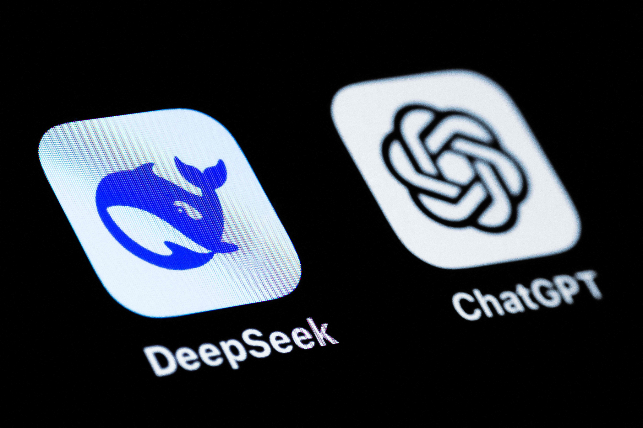 This photograph shows the logo of the Chinese app DeepSeek, left, and U.S. app ChatGPT displayed on a mobile phone in Paris on Jan. 28. [AFP/YONHAP]