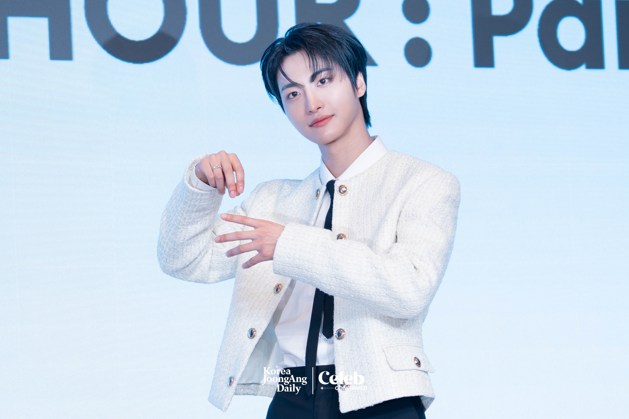 Ateez’s Seonghwa poses for photos during a news conference for the release of its 12th EP, “Golden Hour: Part.3,” at Hotel Naru Seoul MGallery Ambassador in western Seoul. [DANIELA GONZALEZ PEREZ]