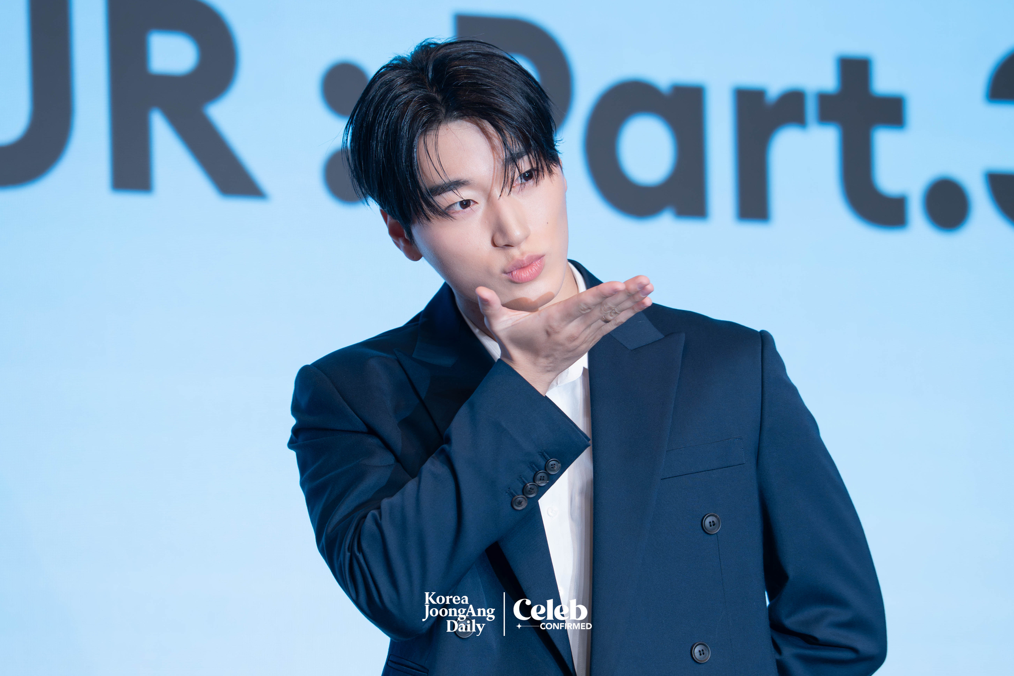 Ateez’s San poses for photos during a news conference for the release of its 12th EP, “Golden Hour: Part.3,” at Hotel Naru Seoul MGallery Ambassador in western Seoul. [DANIELA GONZALEZ PEREZ]