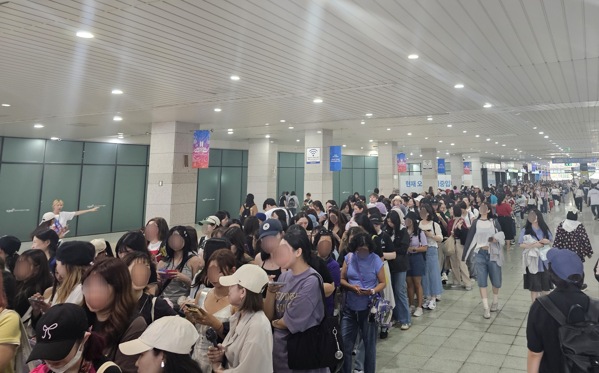 BTS fans line up inside Kintex in Goyang, Gyeonggi, during the 2025 BTS Festa In-person Event on June 13. [SHIN HA-NEE]