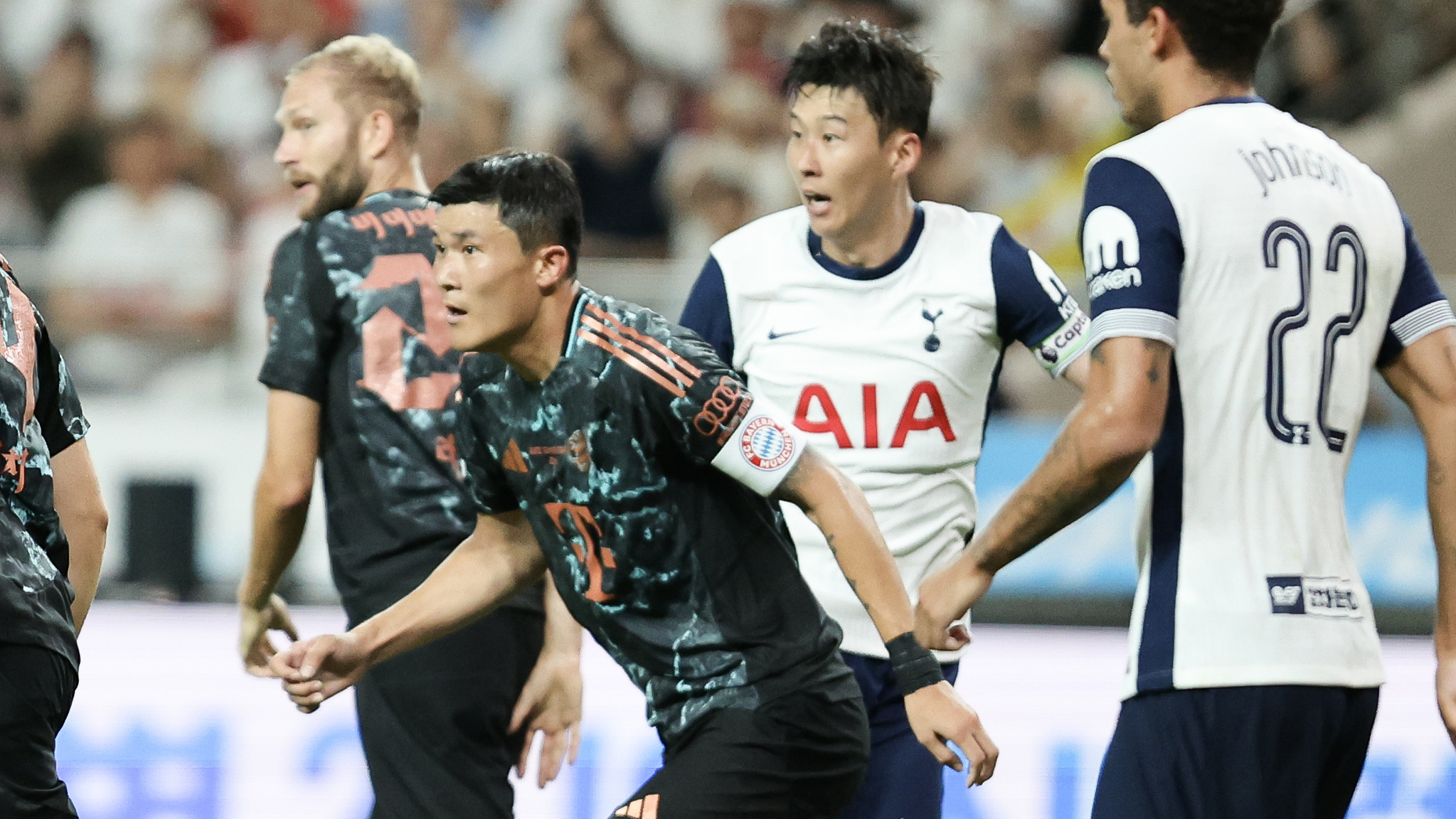 Tottenham Hotspur captain Son Heung-min, center right, and Bayern Munich defender Kim Min-jae, center left, in action during a Coupang Play Series match at the Seoul World Cup Stadium in western Seoul on Aug. 3, 2024 [JOONGANG ILBO] 