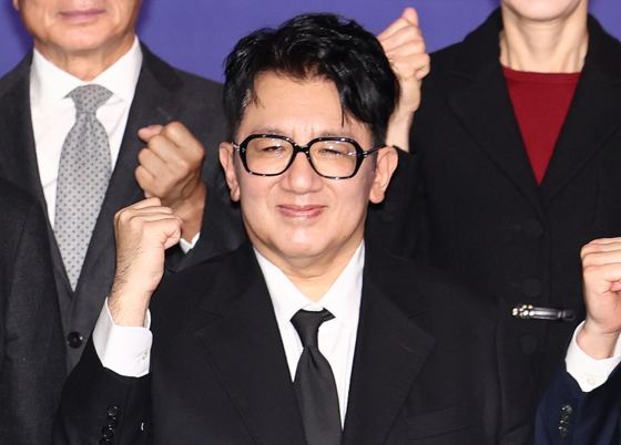 HYBE chairman Bang Si-hyuk poses for photos during a general meeting of members of The Federation of Korean Industries held in western Seoul on Feb. 20. [YONHAP]