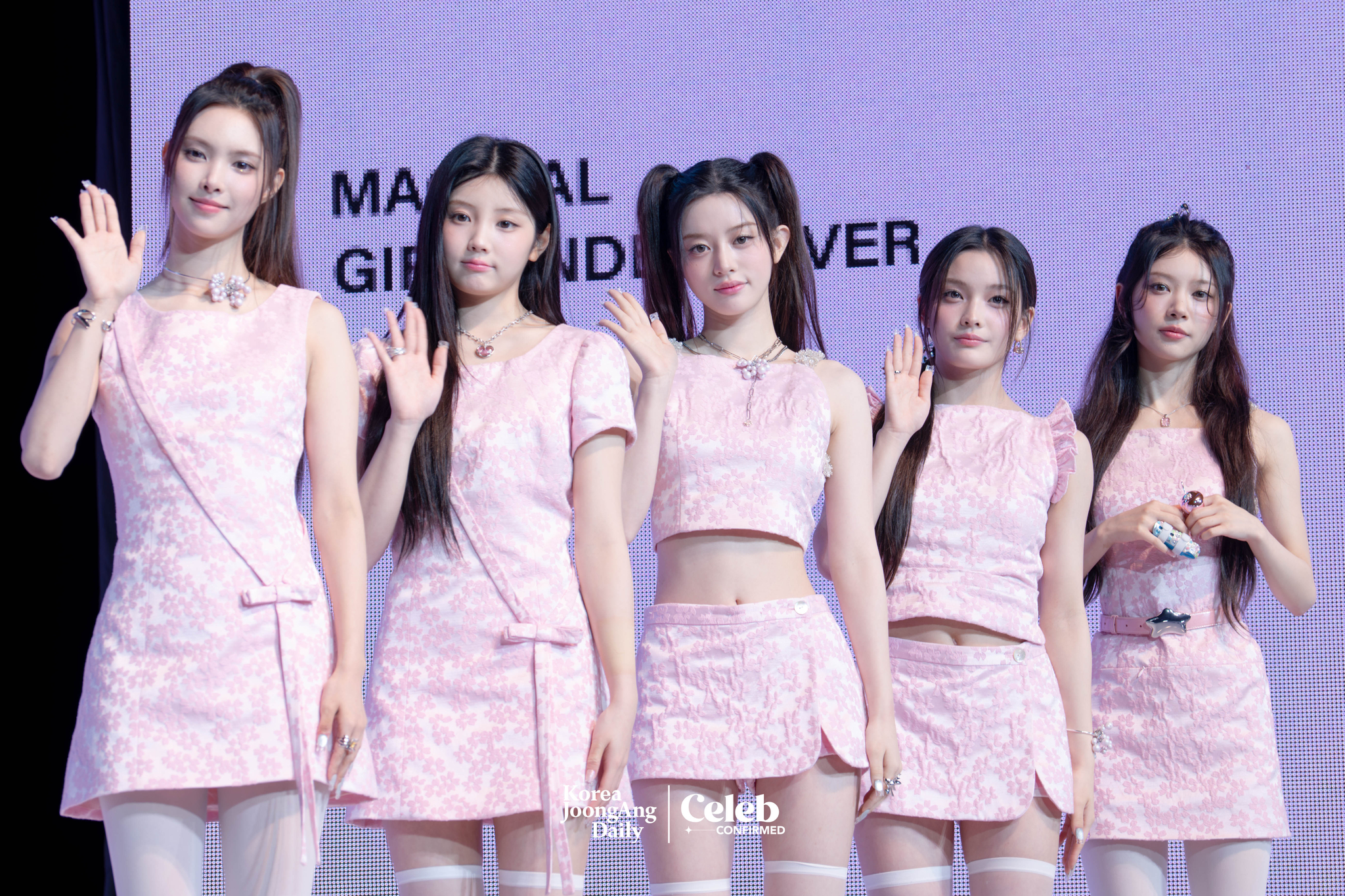 Girl group ILLIT poses for photos during a showcase for the release of its 3rd EP, “bomb,” at Yes24 Live Hall in eastern Seoul on June 16. [DANIELA GONZALEZ PEREZ]