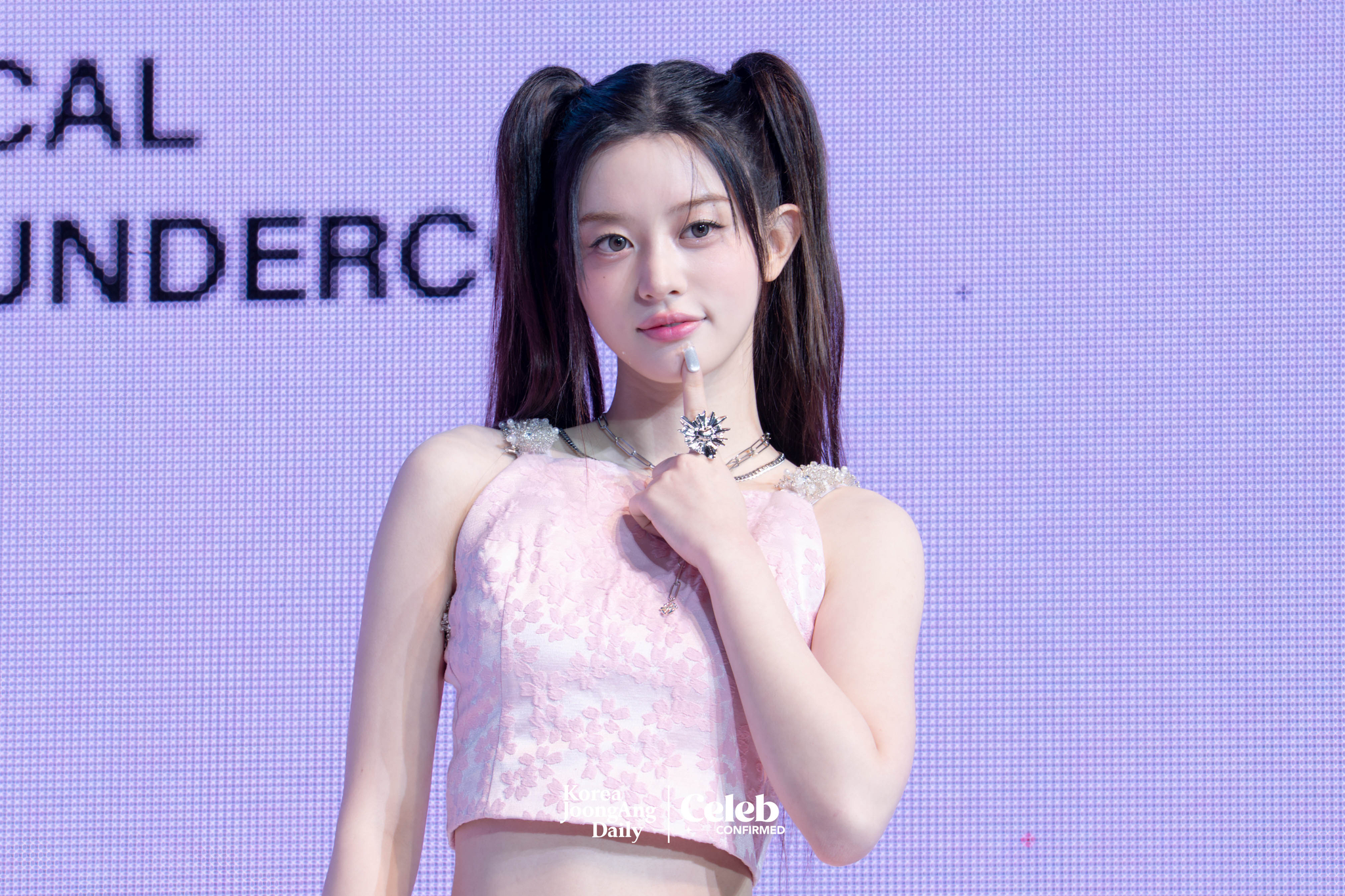 ILLIT’s Minju poses for photos during a showcase for the release of the EP, “bomb,” at Yes24 Live Hall in eastern Seoul on June 16. [DANIELA GONZALEZ PEREZ]