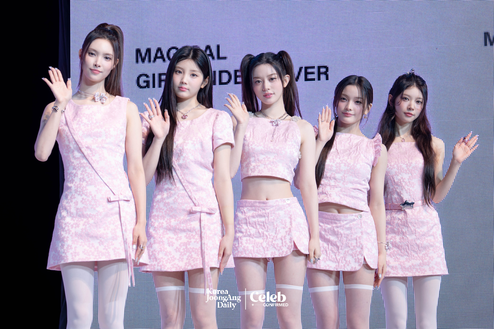 Girl group ILLIT poses for photos during a showcase for the release of its 3rd EP, “bomb,” at Yes24 Live Hall in eastern Seoul on June 16. [DANIELA GONZALEZ PEREZ]