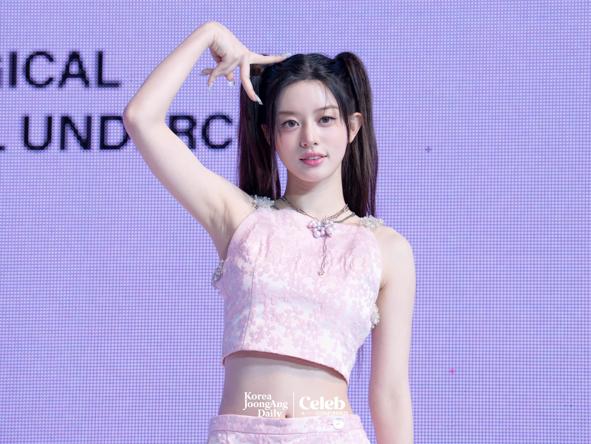 ILLIT’s Minju poses for photos during a showcase for the release of the EP, “bomb,” at Yes24 Live Hall in eastern Seoul on June 16. [DANIELA GONZALEZ PEREZ]