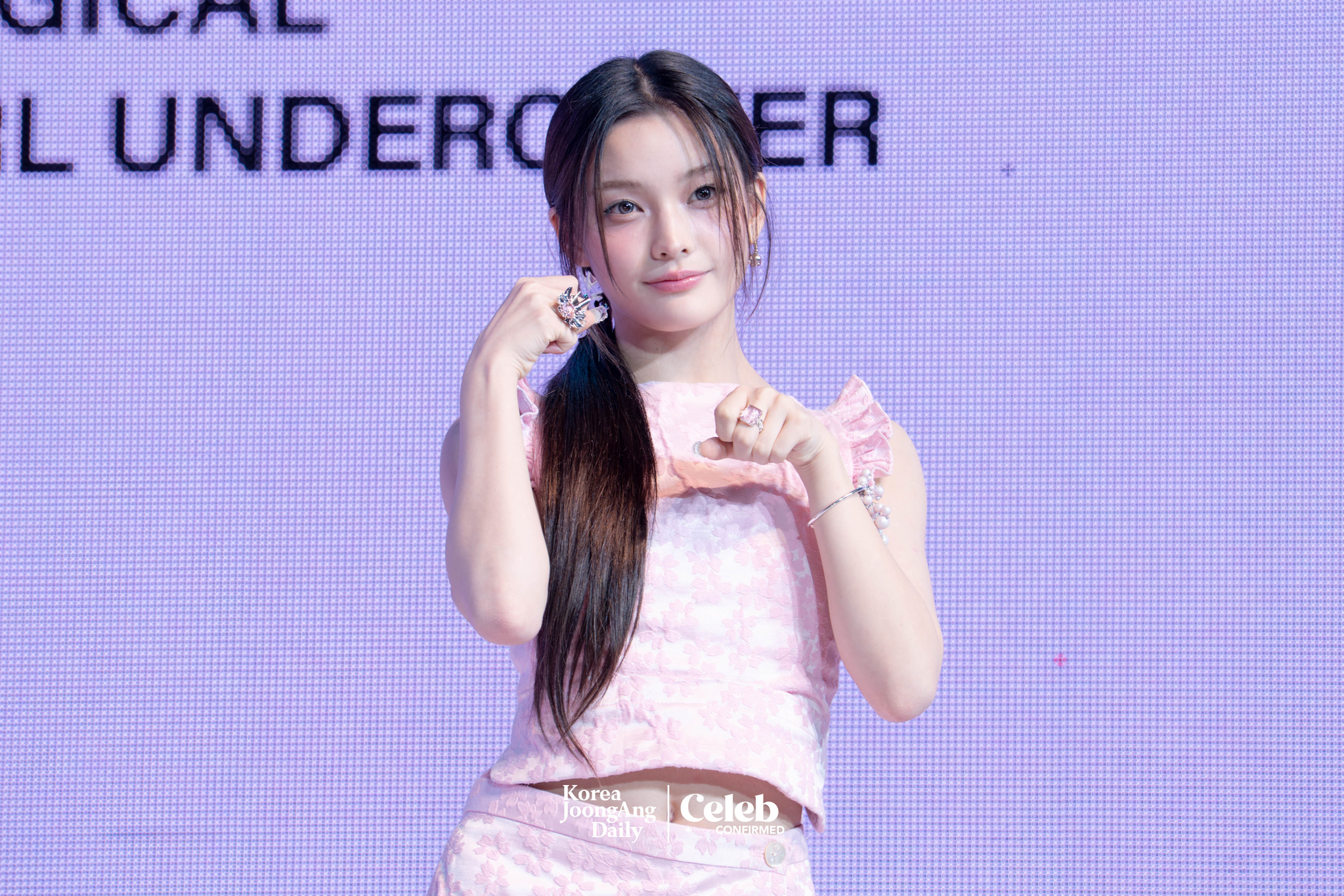 ILLIT’s Iroha poses for photos during a showcase for the release of the EP, “bomb,” at Yes24 Live Hall in eastern Seoul on June 16. [DANIELA GONZALEZ PEREZ]