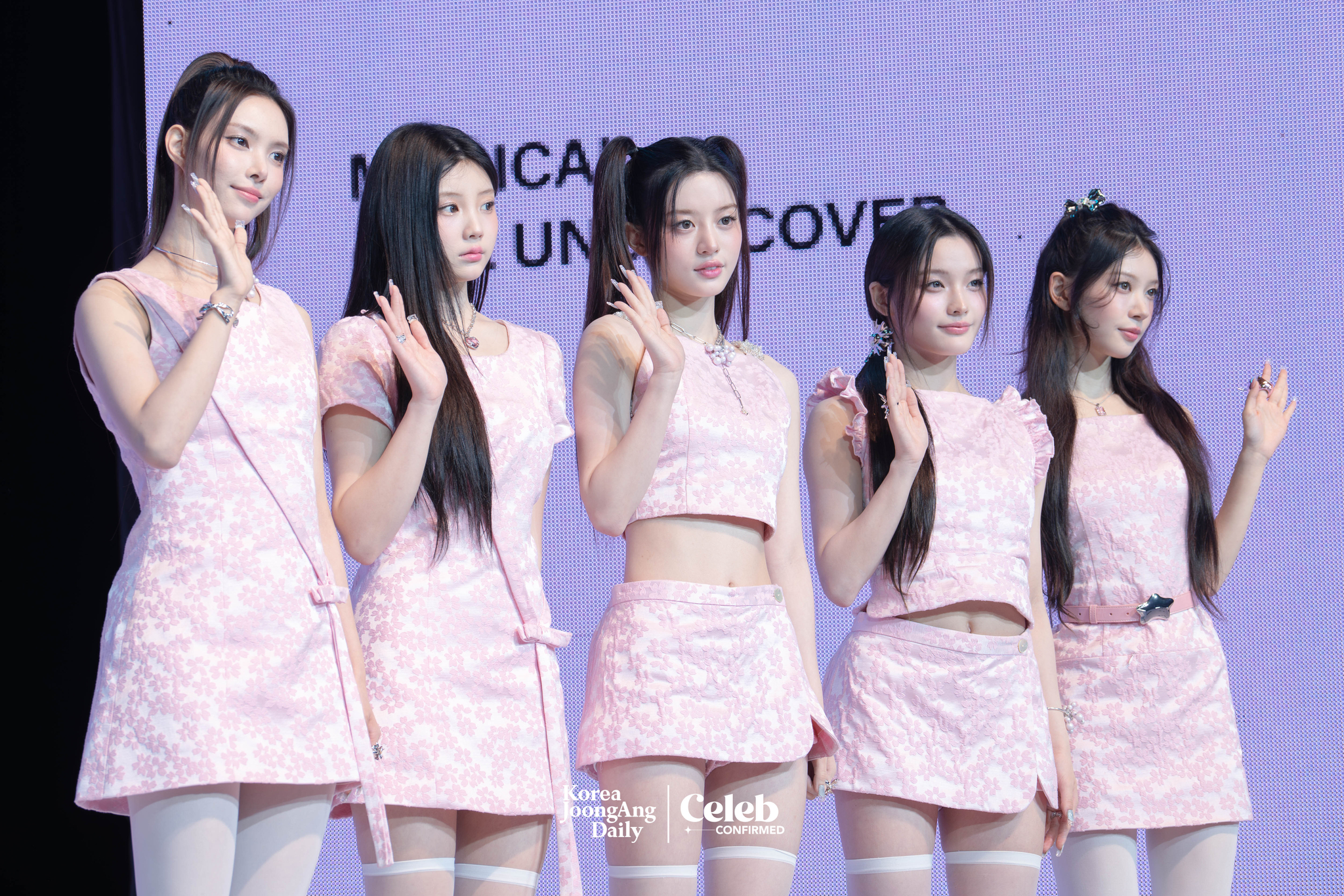 Girl group ILLIT poses for photos during a showcase for the release of its 3rd EP, “bomb,” at Yes24 Live Hall in eastern Seoul on June 16. [DANIELA GONZALEZ PEREZ]