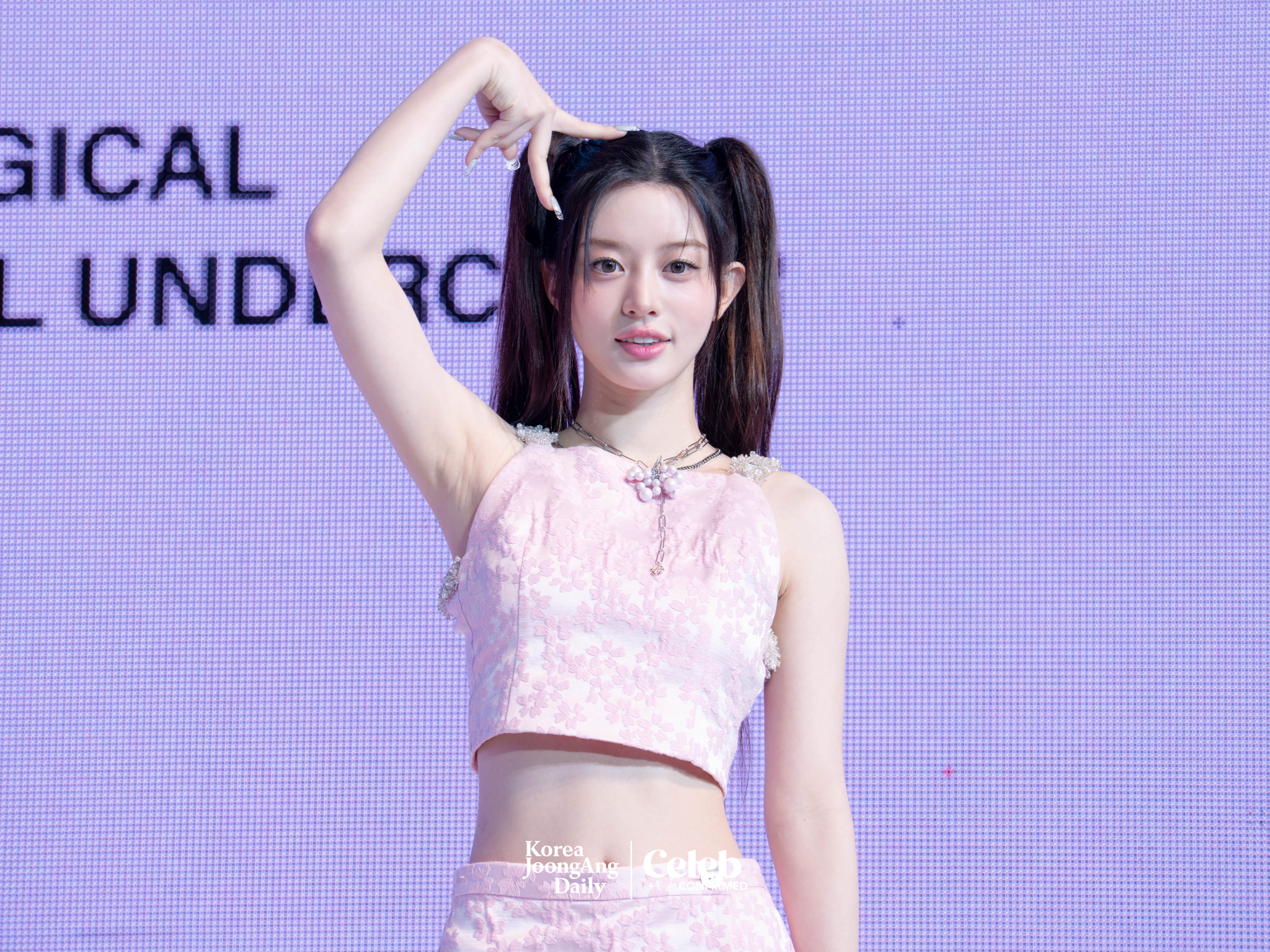 ILLIT’s Minju poses for photos during a showcase for the release of the EP, “bomb,” at Yes24 Live Hall in eastern Seoul on June 16. [DANIELA GONZALEZ PEREZ]
