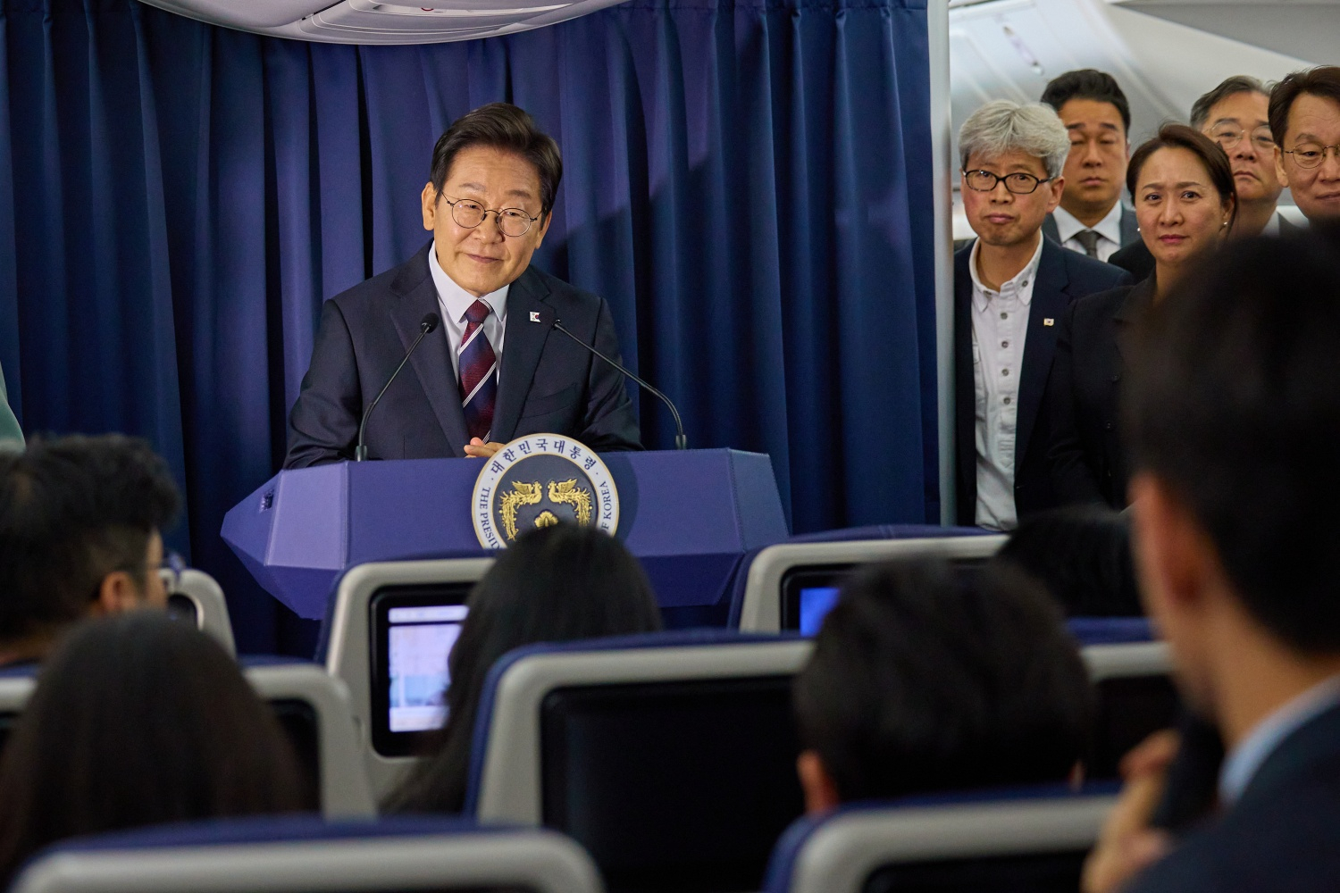 President Lee Jae Myung speaks to reporters at a press briefing on a presidential flight en route to the Group of Seven (G7) summit in Canada on June 16. [JOINT PRESS CORPS]