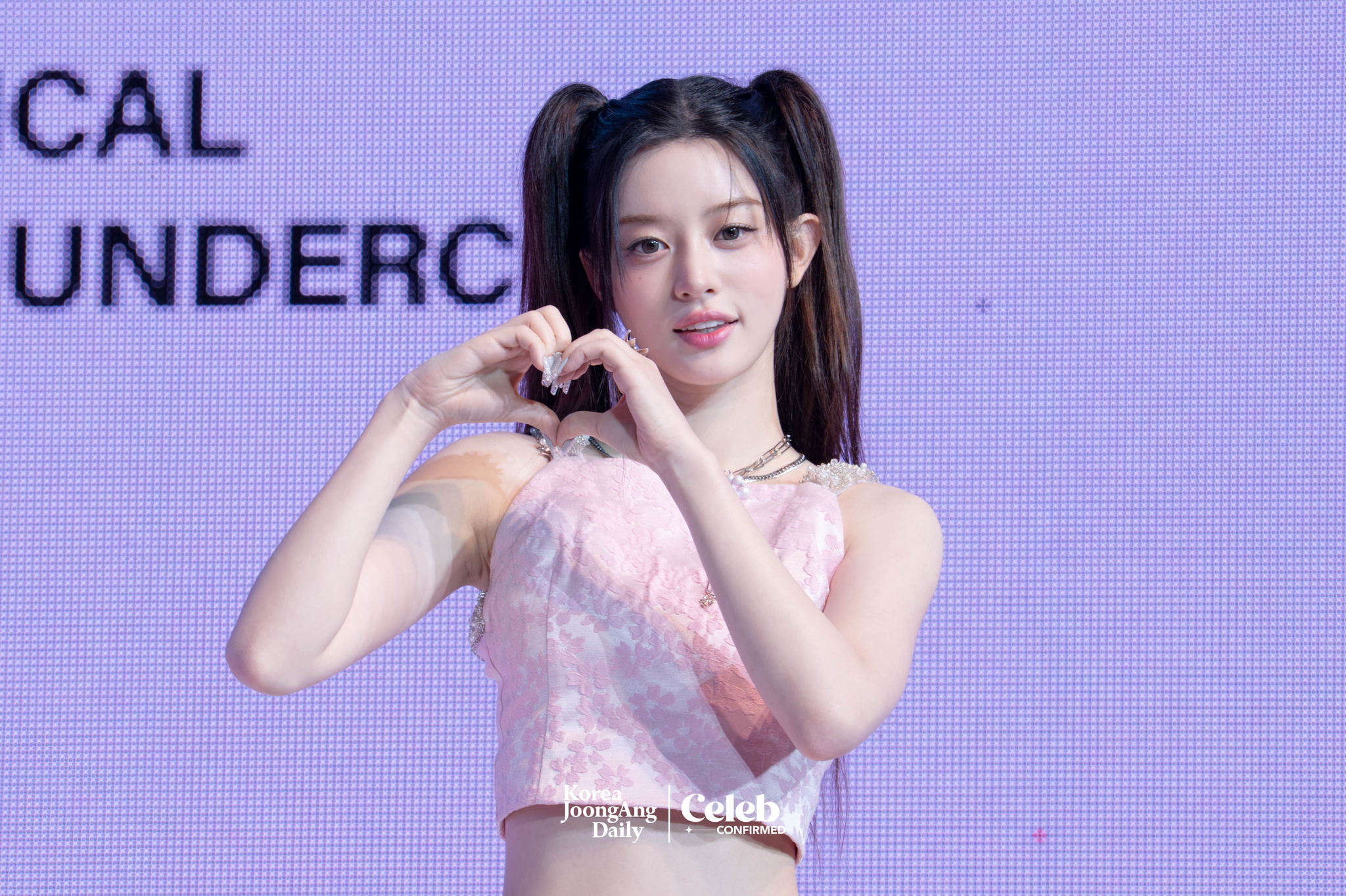 ILLIT’s Minju poses for photos during a showcase for the release of the EP, “bomb,” at Yes24 Live Hall in eastern Seoul on June 16. [DANIELA GONZALEZ PEREZ]
