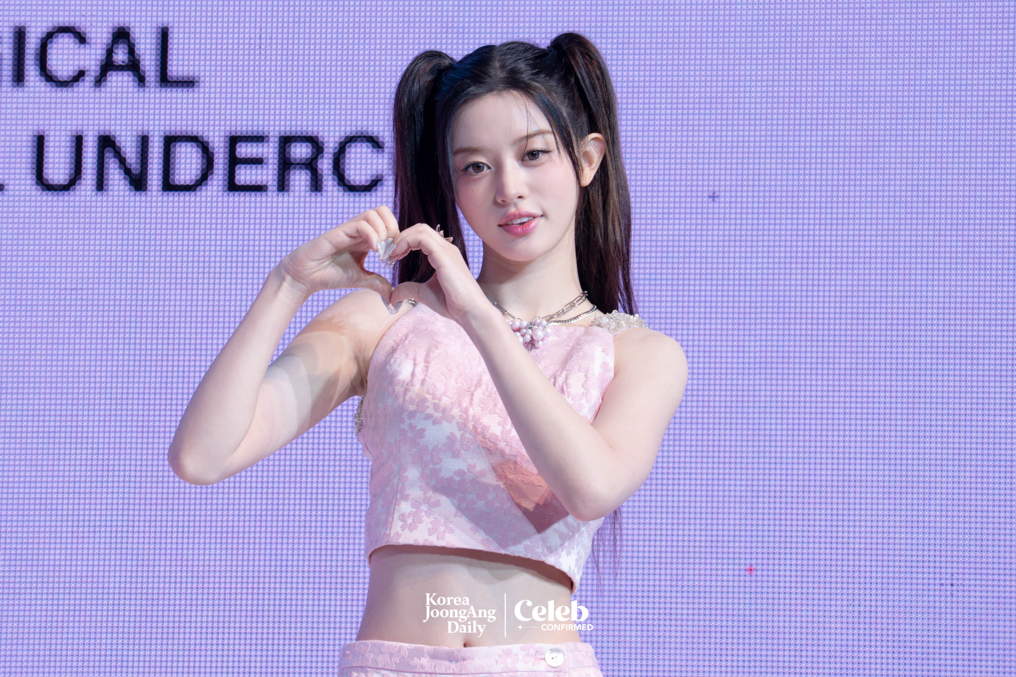 ILLIT’s Minju poses for photos during a showcase for the release of the EP, “bomb,” at Yes24 Live Hall in eastern Seoul on June 16. [DANIELA GONZALEZ PEREZ]