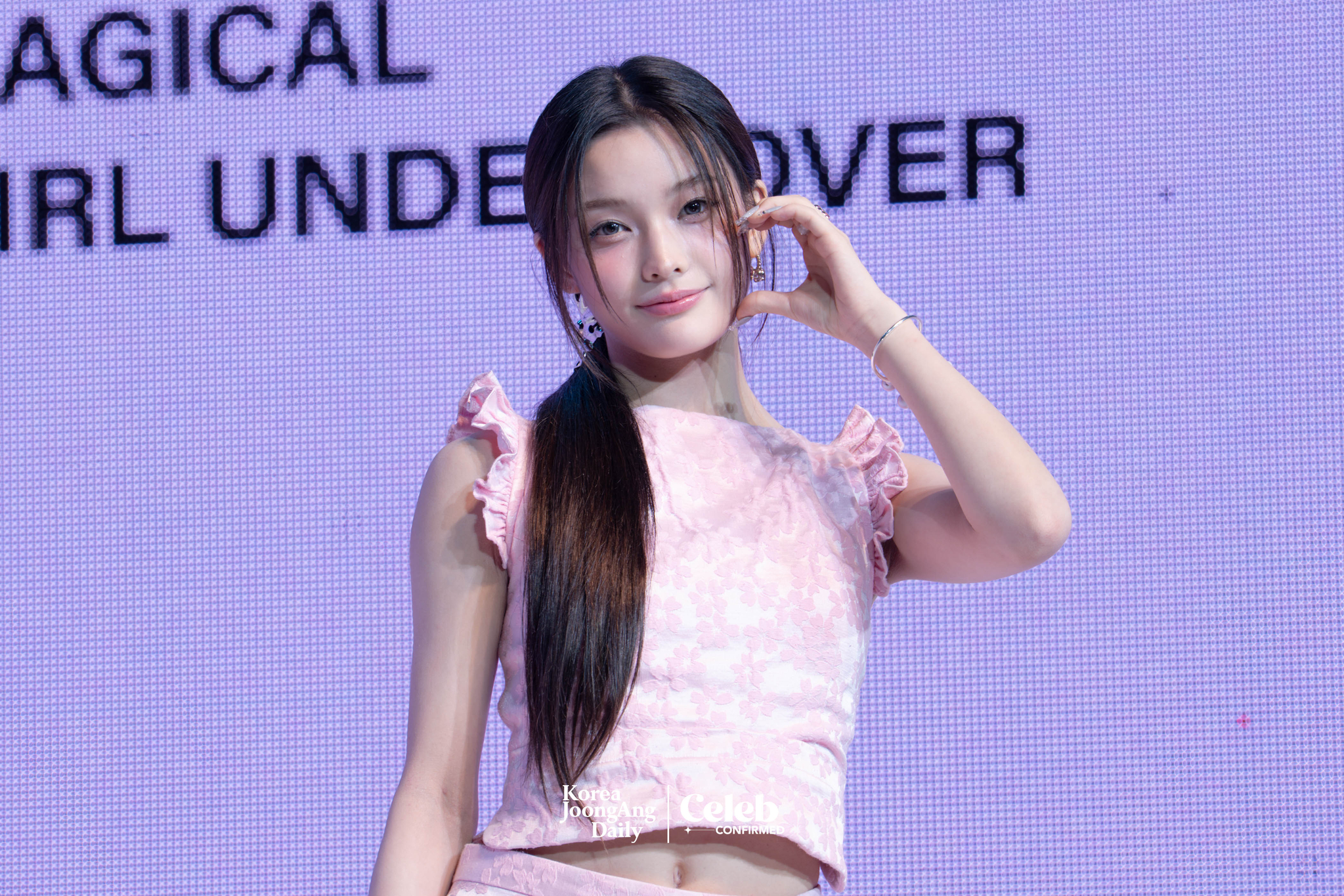 ILLIT’s Iroha poses for photos during a showcase for the release of the EP, “bomb,” at Yes24 Live Hall in eastern Seoul on June 16. [DANIELA GONZALEZ PEREZ]