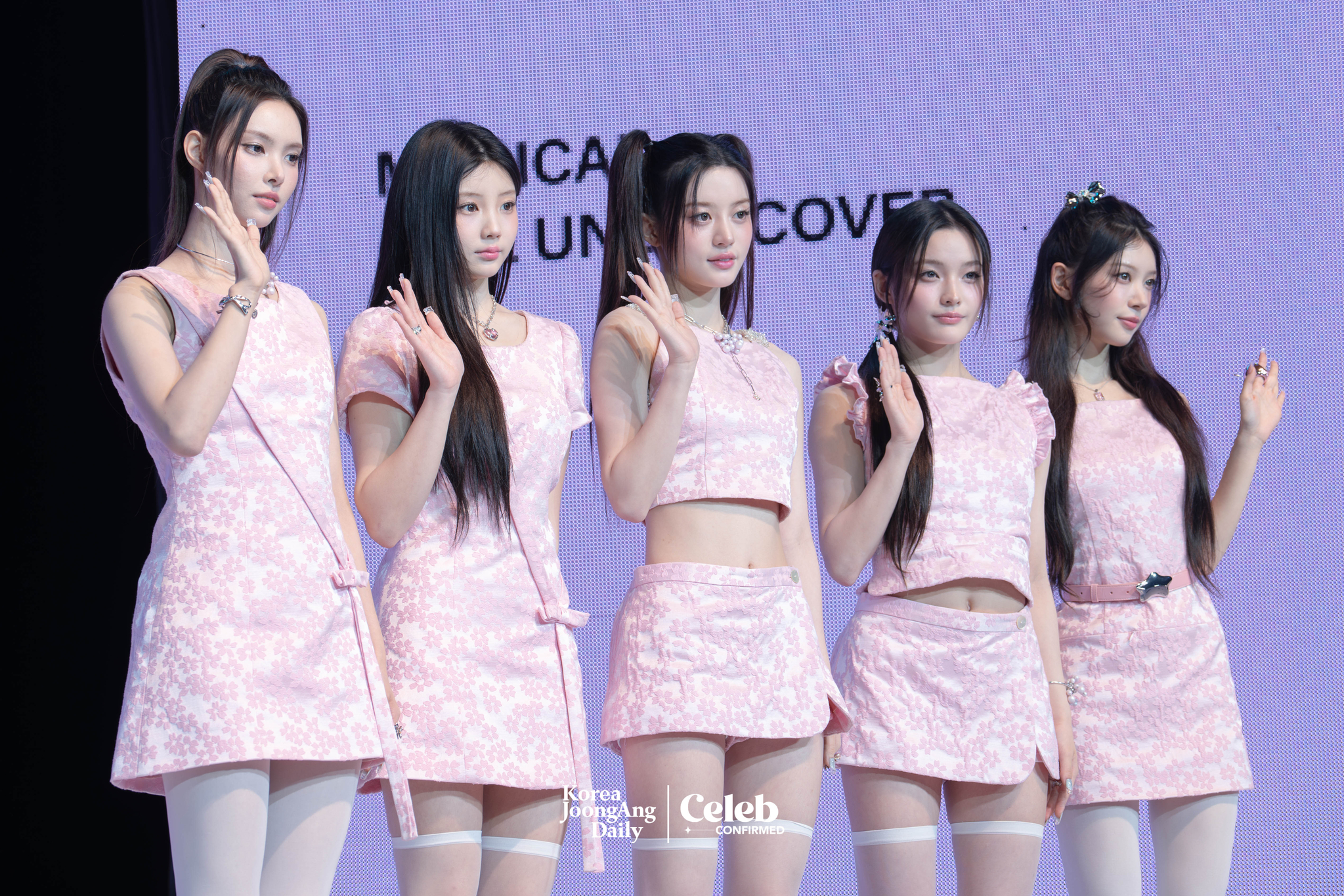 Girl group ILLIT poses for photos during a showcase for the release of its 3rd EP, “bomb,” at Yes24 Live Hall in eastern Seoul on June 16. [DANIELA GONZALEZ PEREZ]