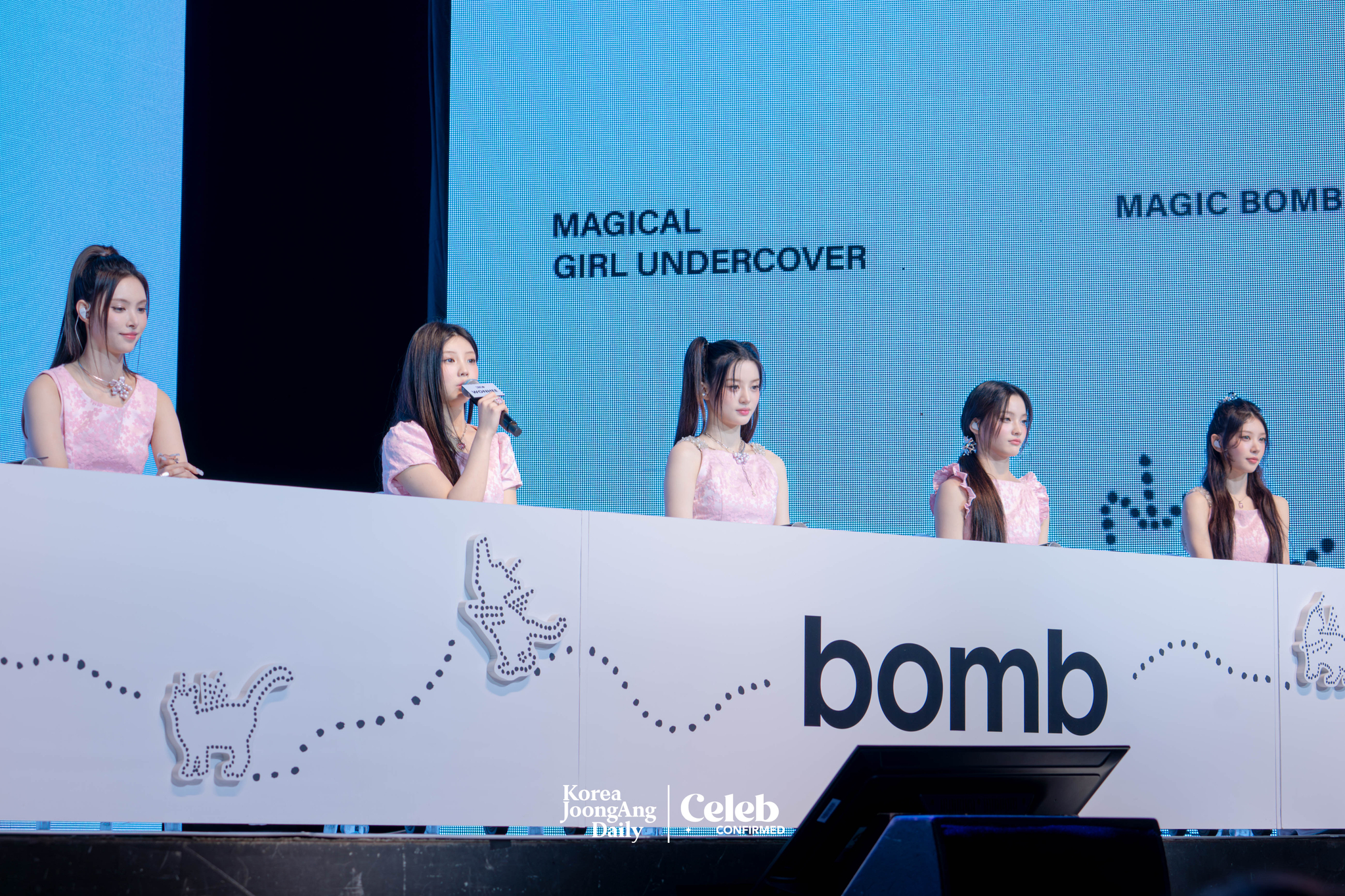 ILLIT answers reporters' questions during a a showcase for the release of its 3rd EP, “bomb,” at Yes24 Live Hall in eastern Seoul on June 16. [DANIELA GONZALEZ PEREZ]