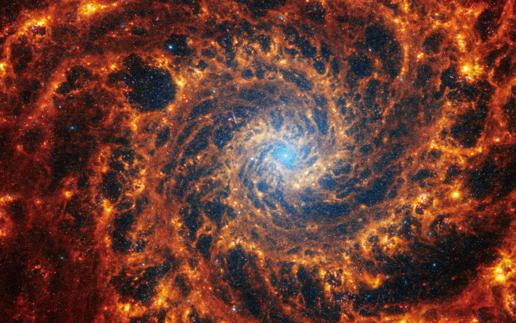 Spiral galaxy NGC 628, located 32 million light-years away from Earth, is seen in an undated image from the James Webb Space Telescope. NASA, ESA, CSA, STScI, Janice Lee (STScI), Thomas Williams (Oxford), and the PHANGS team. [REUTERS/YONHAP]