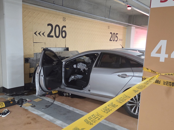 Two women died and two men were seriously injured in a car crash in an apartment complex's underground parking lot in Sejong on June 20. [SEJONG FIRE DEPARTMENT]