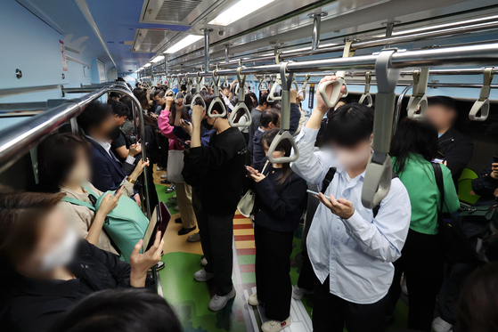 Passengers ride a Line No. 7 subway in Seoul on May 16, 2024. [YONHAP] 