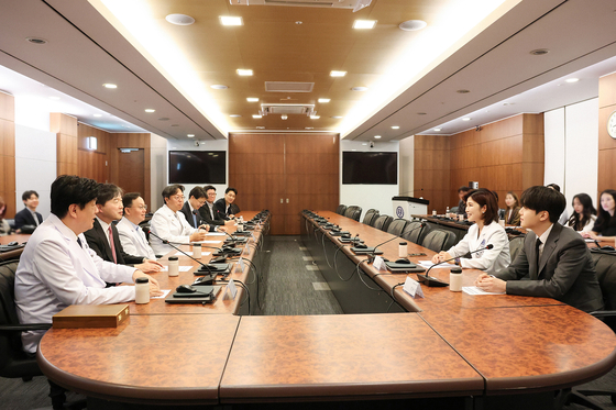 Suga of boy band BTS attends a meeting regarding the establishment of the Min Yoon-gi Center at the Severance Hospital in western Seoul. [SEVERANCE]