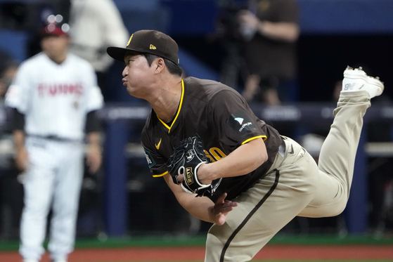 San Diego Padres' pitcher Go Woo-suk Go pitches at the ninth inning of the exhibition game between the San Diego Padres and LG Twins at Gocheok Sky Dome in western Seoul on March 18, 2024. [AP/YONHAP] 