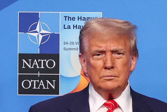 U.S. President Donald Trump poses for a photo during a NATO summit in The Hague, Netherlands June 25, 2025. [REUTERS/YONHAP]