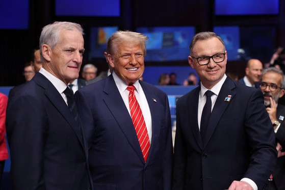U.S. President Donald Trump, Norway's Prime Minister Jonas Gahr Stoere and Polish President Andrzej Duda attend a NATO summit in The Hague, Netherlands June 25, 2025. [REUTERS/YONHAP]