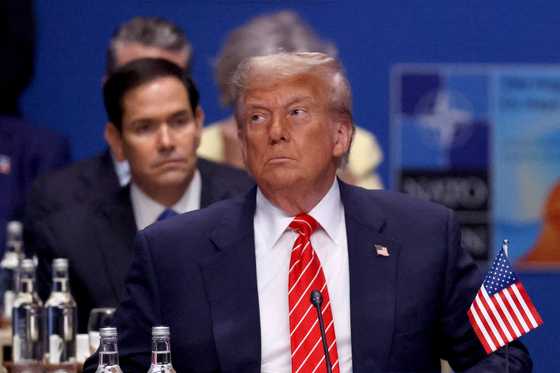 U.S. President Donald Trump attends a meeting of the North Atlantic Council (NAC) during a NATO summit in The Hague, Netherlands June 25, 2025. [REUTERS/YONHAP]