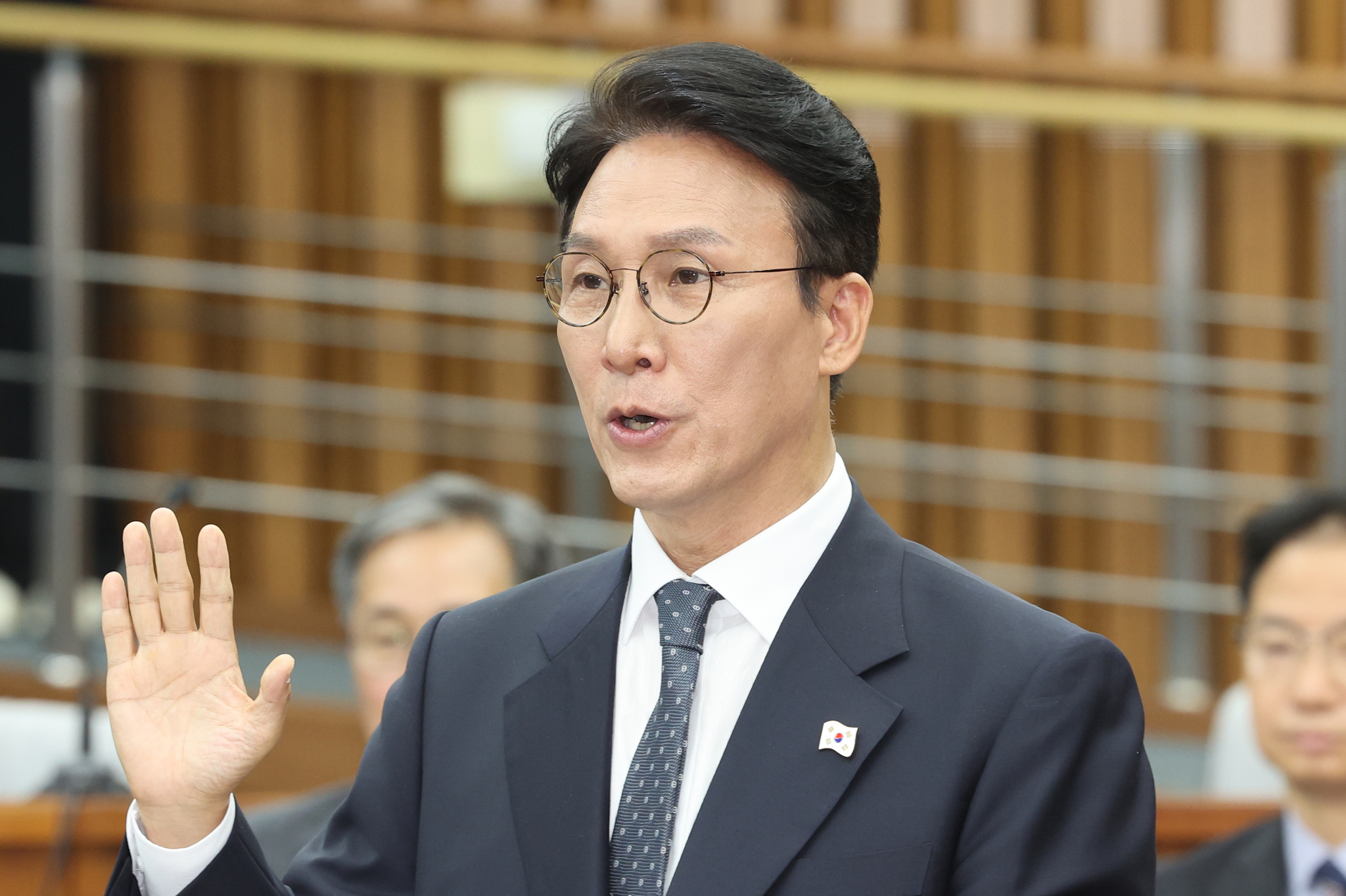 Prime Minister nominee Kim Min-seok takes an oath during his confirmation hearing at the National Assembly in Yeouido, Seoul, on June 24. [YONHAP]