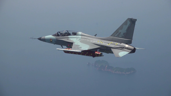 A test FA-50 aircraft equipped with a long-range air-to-surface guided missile under development is pictured in this photo provided by the Defense Acquisition Program Administration on June 25. [NEWS1]