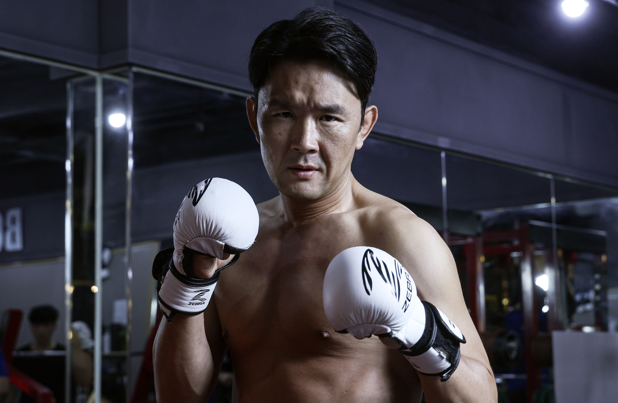 Yoon Hyung-bin, comedian turned MMA fighter, poses for cameras in a gym in Mapo District, western Seoul. [KIM SEONG-RYONG]
