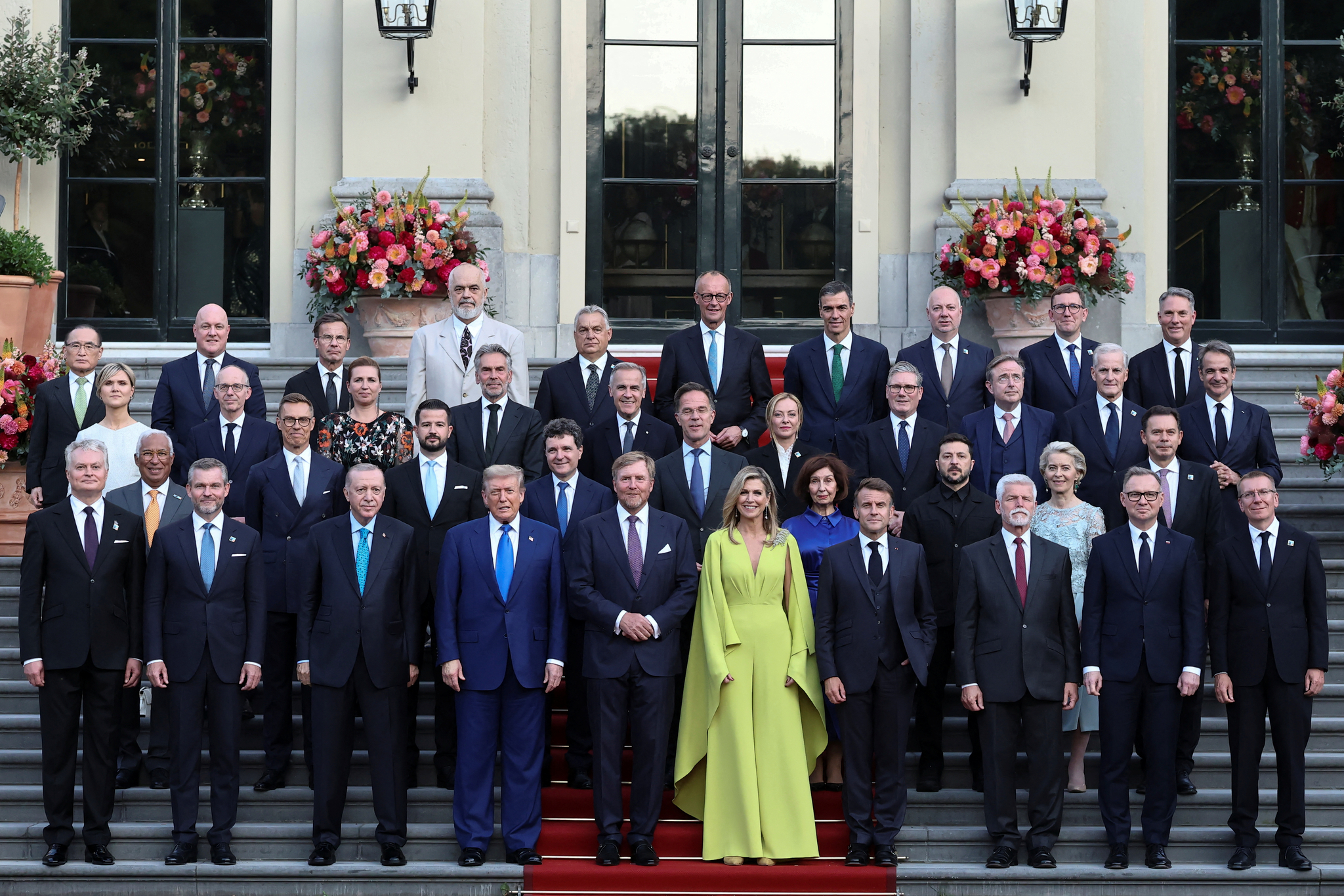 National Security Adviser Wi Sung-lac, back row left, poses for a photo with world leaders including U.S. President Donald Trump ahead of a dinner hosted by Dutch King Willem-Alexander and Dutch Queen Maxima on the sidelines of a NATO Summit at Huis ten Bosch Palace in The Hague, Netherlands, on June 24. [REUTERS/YONHAP'