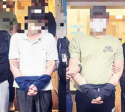 Police arrest an embezzlement suspect and an online gambling operator in the Philippines and forcibly repatriate them to Korea on the morning of June 27. [KOREAN NATIONAL POLICE AGENCY] 