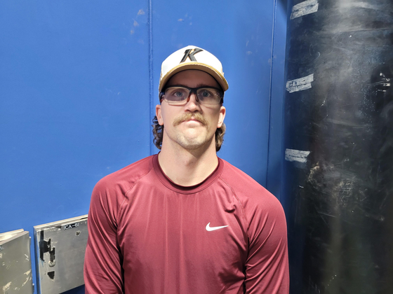 Kiwoom Heroes starter Lachlan Wells poses for a photo after an interview with Yonhap News Agency at Gocheok Sky Dome in Seoul on June 26. [YONHAP]