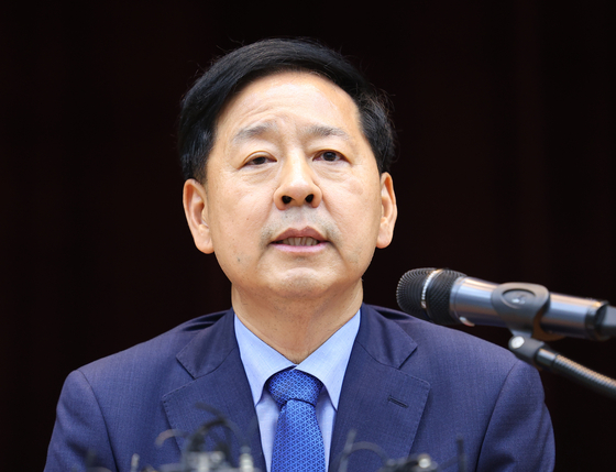 Finance minister nominee Koo Yun-cheol speaks to reporters in a press conference held shortly after his nomination was announced by the presidential office on June 29. [YONHAP]
