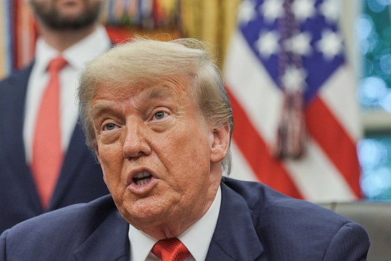 U.S. President Donald Trump speaks during a meeting at the Oval Office at the White House in Washington on June 27. [REUTERS/YONHAP]