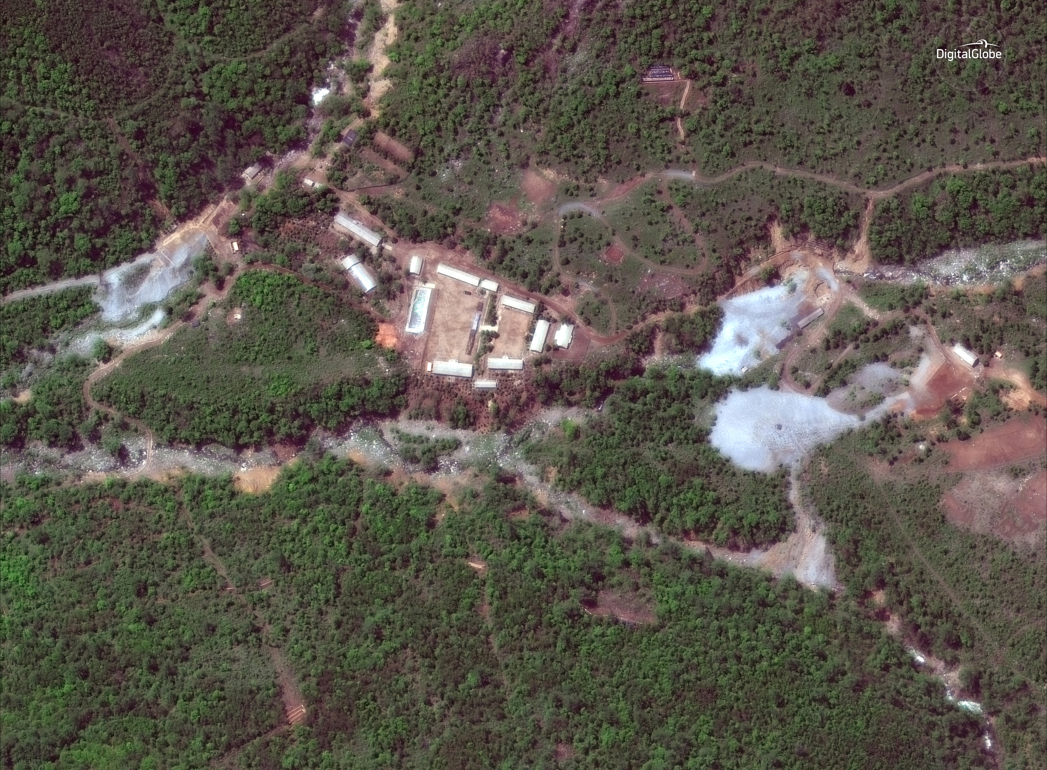 This May 23, 2018, satellite image provided by DigitalGlobe shows the nuclear test site in Punggye-ri, North Korea. A group of foreign journalists went to watch the dismantling of the nuclear test site after eight reporters from South Korea received last-minute permission to join them. [AP/YONHAP]