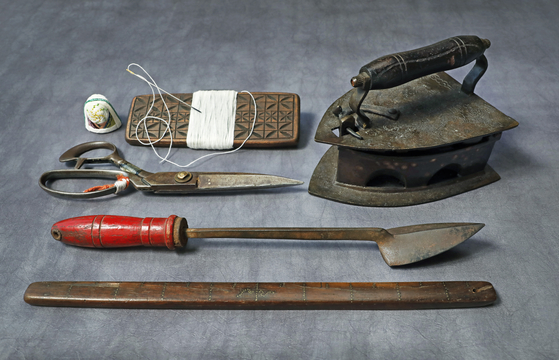 Thread, needle, scissors, ruler, thimble, iron and heavier iron used by women of Gyubang [PARK SANG-MOON]