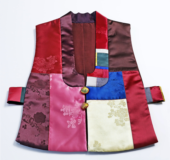 Sleeveless over-jacket worn atop a hanbok vest, called jeogori [PARK SANG-MOON]