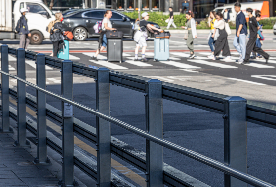 Reinforced guardrails are seen installed at the site of the Seoul City Hall crash that killed nine people on July 1, 2024. [NEWS1]