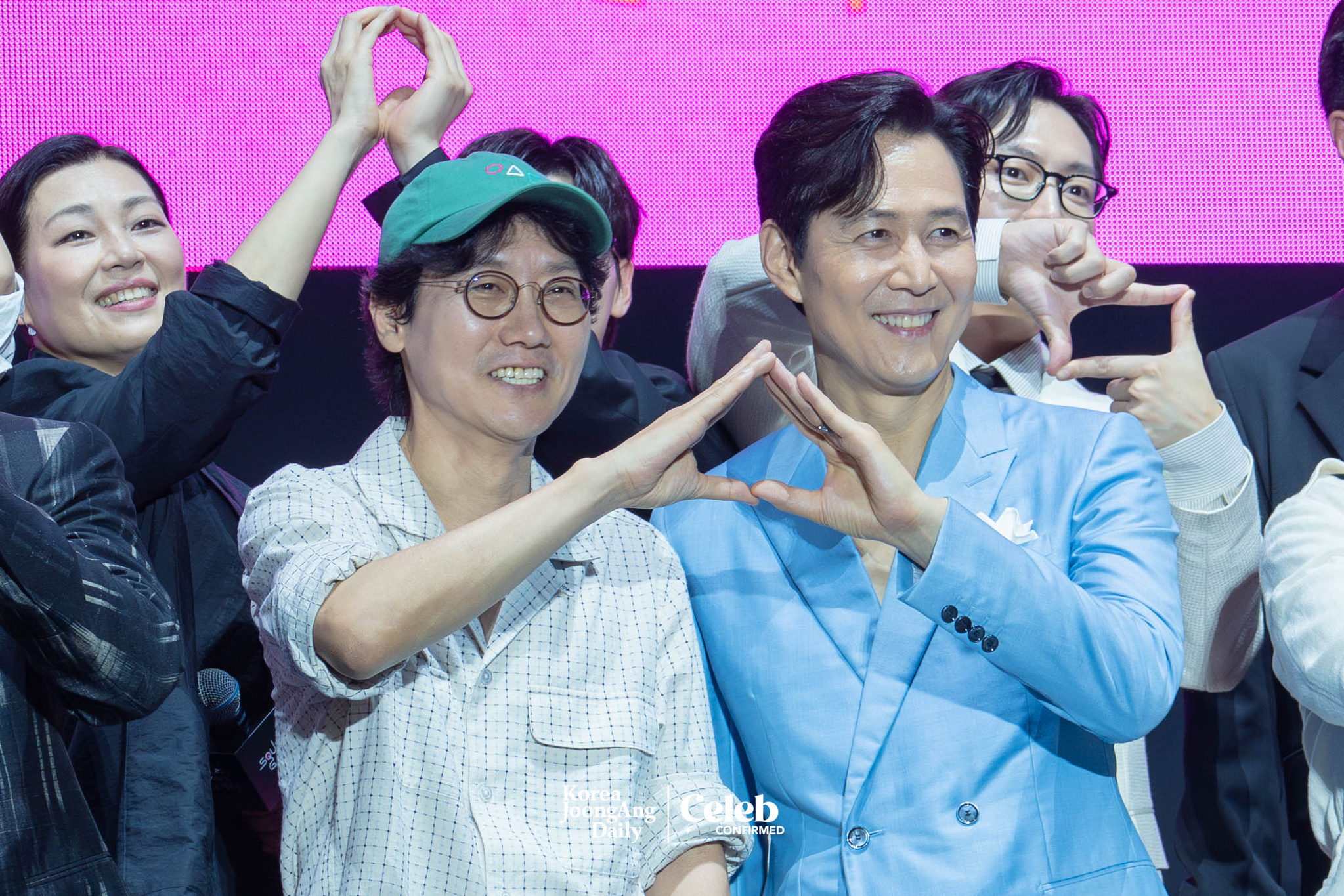Actor Lee Jung-jae and director Hwang Dong-hyuk during a fan event for the release of the third season of “Squid Game” (2021-) at Seoul Plaza in central Seoul on June 28. [DANIELA GONZALEZ PEREZ]