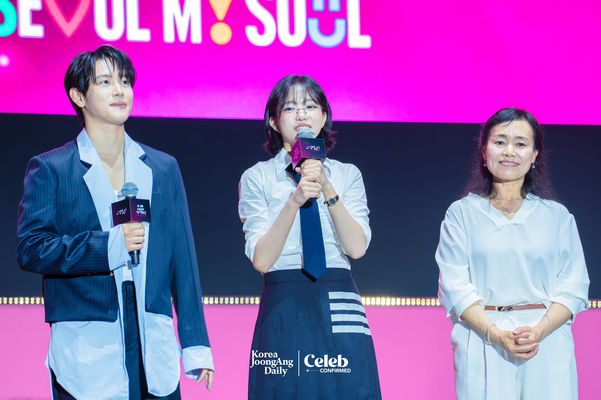 Actors Yim Si-wan, Jo Yu-ri and Kang Ae-sim during a fan event for the release of the third season of “Squid Game” (2021-) at Seoul Plaza in central Seoul on June 28. [DANIELA GONZALEZ PEREZ]