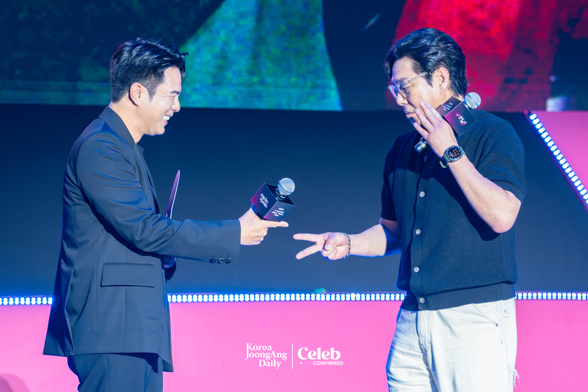 Actors Jun Suk-ho, and Kim Pub-lae during a fan event for the release of the third season of “Squid Game” (2021-) at Seoul Plaza in central Seoul on June 28. [DANIELA GONZALEZ PEREZ]