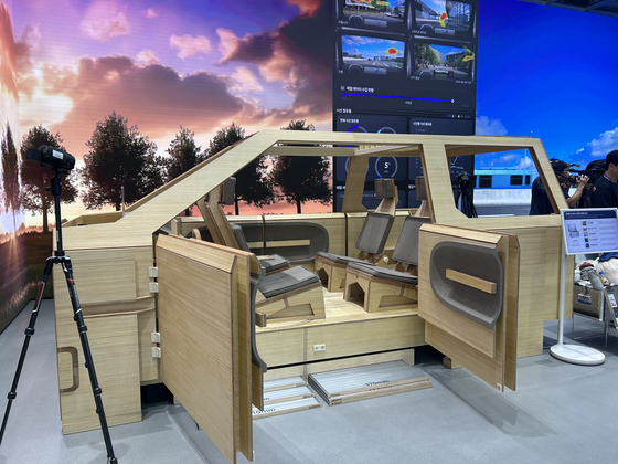 A wooden prototype buck of a van is placed on the first floor of the UX Studio Seoul, installed with swivel seats so that passengers in the front and second rows can face each other, in Hyundai Motor's Gangnam office in southern Seoul. [SARAH CHEA]