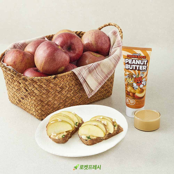 A promotional image for Coupang's “Saving Private Apple” product, which pairs 2.5 kilograms (5.5 lbs) of imperfect apples with 160 grams of peanut butter [COUPANG]