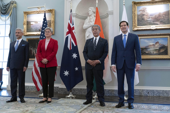 U.S. Secretary of State Marco Rubio, right, accompanied from left Indian External Affairs Minister Subrahmanyam Jaishankar, Australian Foreign Minister Penny Wong and Japanese Foreign Minister Iwaya Takeshi, stands for a group photo during the Indo-Pacific Quad meeting at the State Department in Washington on July 1. [AP/YONHAP]