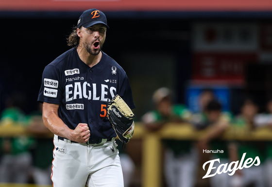 The Hanwha Eagles will finish the first half of the regular season at the top of the standings for the first time in 33 years. On July 6, Hanwha swept the weekend series with a dominant 10-0 away victory against the Kiwoom Heroes at Gocheok Sky Dome in Seoul. In this picture is the standout performer in the July 6 win over Kiwoom, Hanwha pitcher Ryan Weiss. [Hanwha Eagles]