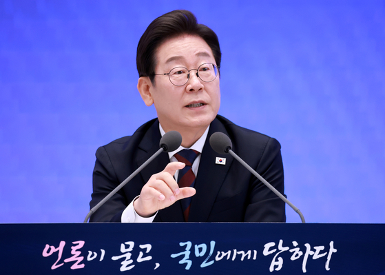 President Lee Jae Myung answers questions from reporters during his first press conference after taking office on July 3. [JOINT PRESS CORPS]
