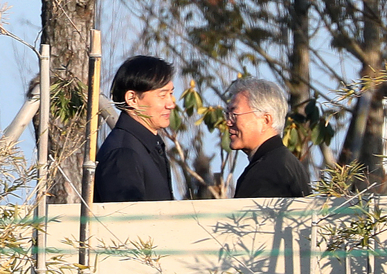 Former Minister of Justice Cho Kuk, left, visits former President Moon Jae-in at the latter's private house in Yangsan, South Gyeongsang, on Feb. 12, 2024. [NEWS1]